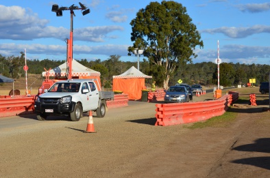 Cars wait to get in to covid checkpoint