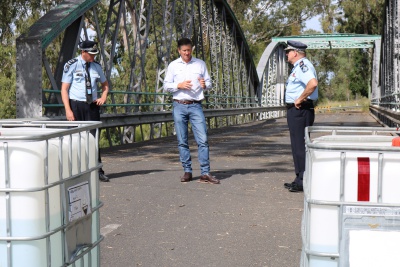 Police and Lawrence on closed bridge